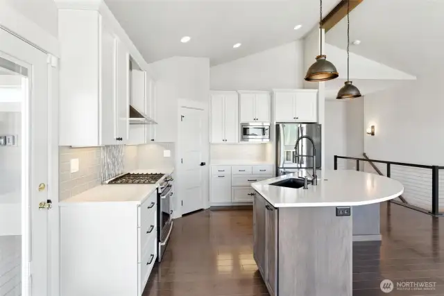 Kitchen with exit to deck just to the left