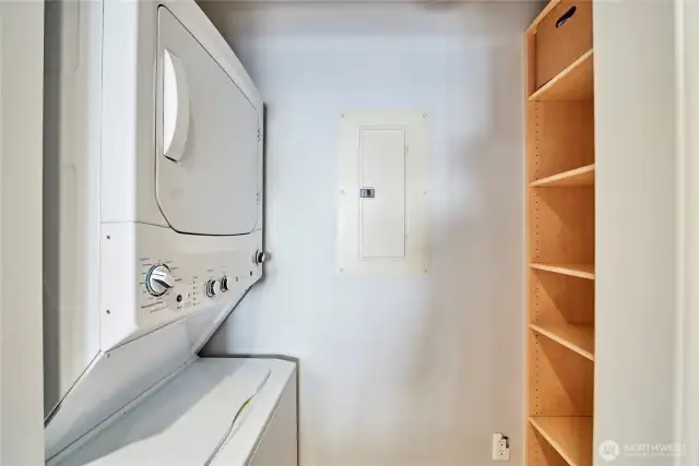 Convenient stack washer & dryer and additional pantry storage.