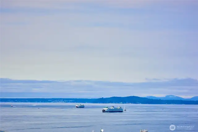 A look at the WA State Ferries crossing Elliott Bay from the rooftop deck.