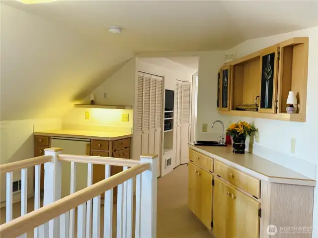 A small fridge stays with the house.  Sink to the right of the room, just add a microwave and/or a hotplate.