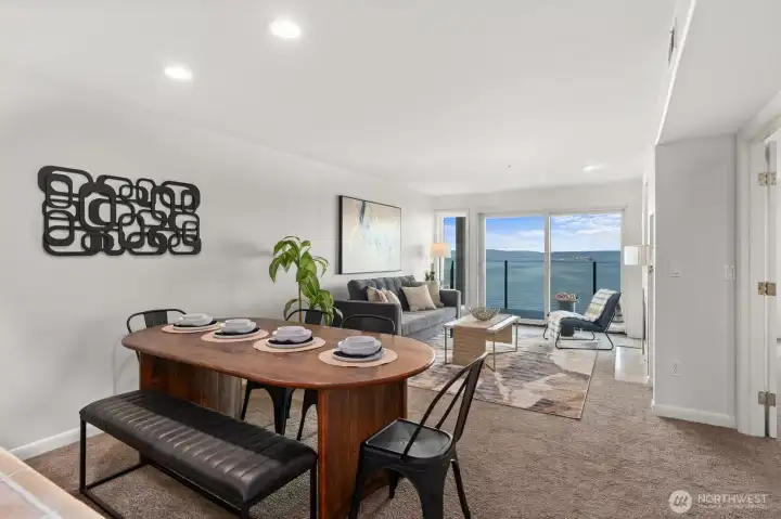 The dining area is large enough for six plus additional seating at the breakfast bar.