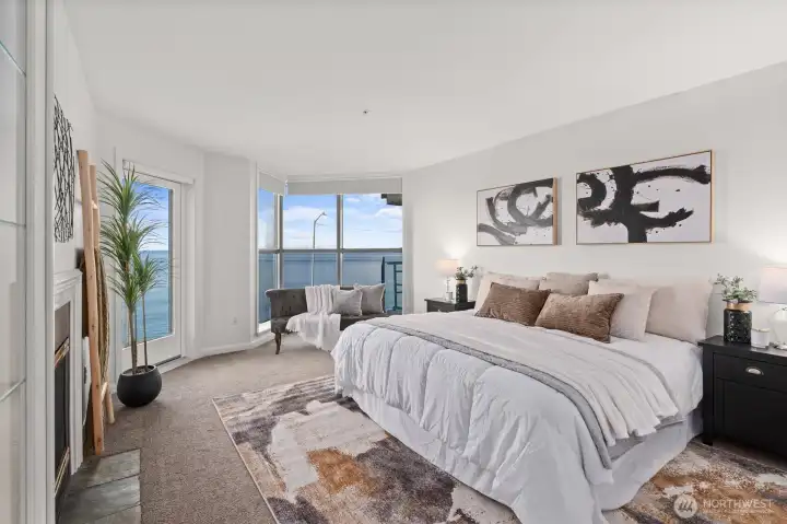 The view-facing Primary Suite features a gas fireplace and access to the view deck.