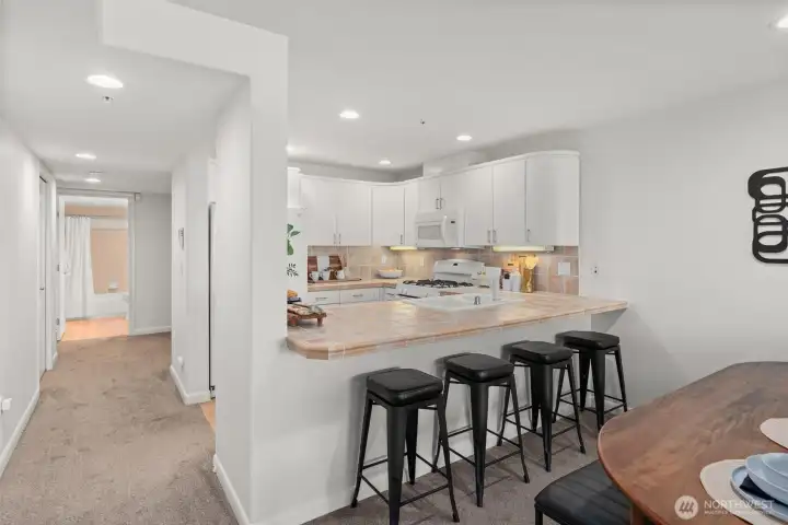The breakfast bar has seating for four!