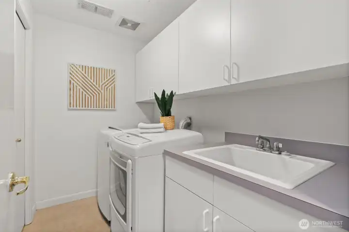 Laundry room with sink.