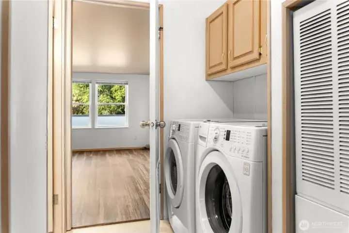 Generous sized utility and laundry room.