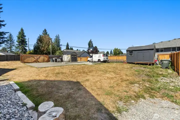 View from Lot A towards Lot C, the line between lot A & C is approximately just past the tip of the shadow in this photo & does cross into concrete pad where double gate is, so the gate will need to be adjusted if someone doesn't buy Lot A w/lot C