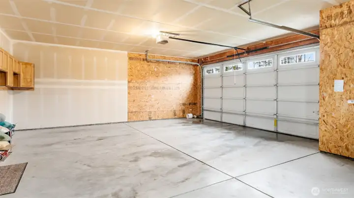 Attached 3 car garage with extra space