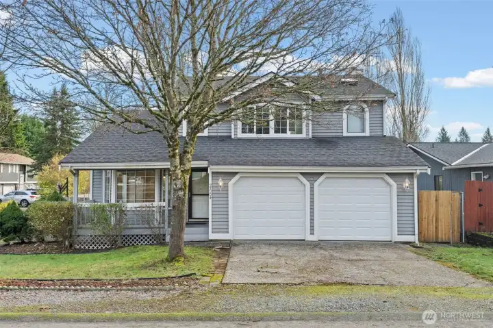 Welcome home to this two-story residence in the Cherokee Bay Community, showcasing timeless curb appeal and a welcoming front porch perfect for morning coffee or evening chats. The attached two-car garage and large front windows complete the inviting look of this Maple Valley gem.