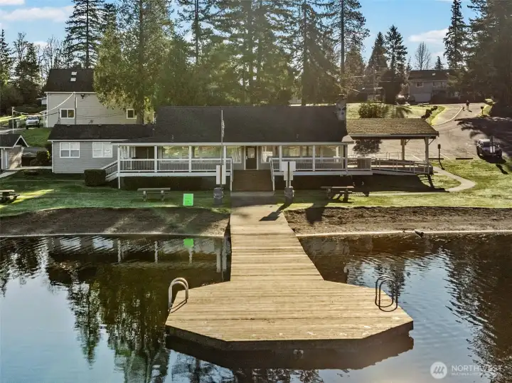 Enjoy lakeside living with community amenities that include a private boat launch, clubhouse, full club kitchen, and non-fluoridated water—perfect for gatherings and waterfront fun.