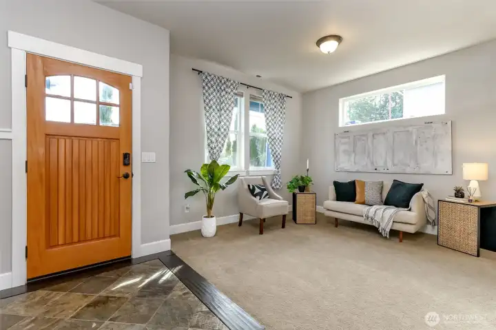tile entry way opens to formal living space
