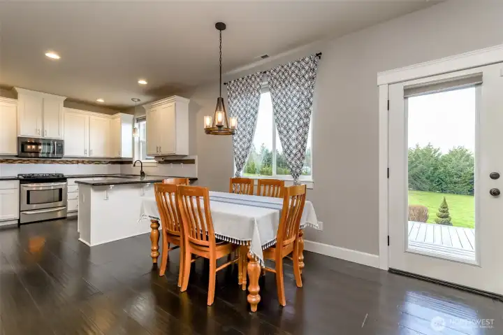 eat in dining room off the kitchen with an eat- in counter