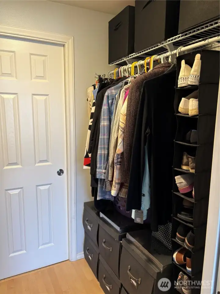 This unit has lots of storage! A coat closet, this walk-in closet, the built-ins in the dining room, and shelves next to the washer and dryer.