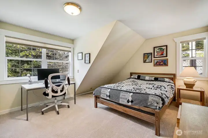 The office has plenty  of room and overlooks the front.