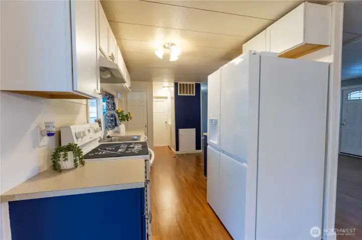Kitchen with Timeless Finishes and full-size Refrigerator