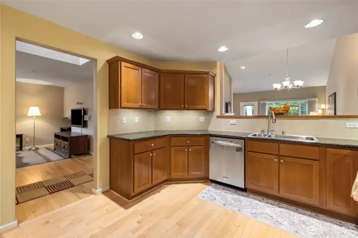 Kitchen is open to living room and dining room areas.
