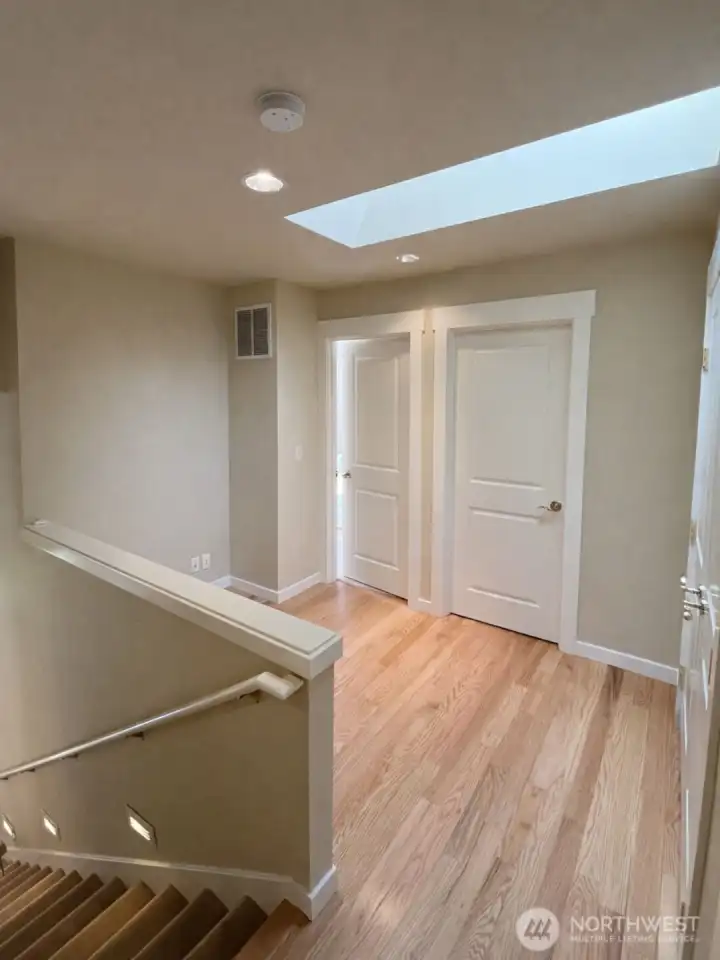 Upstairs - new landing just installed! Beautiful oak hardwoods.