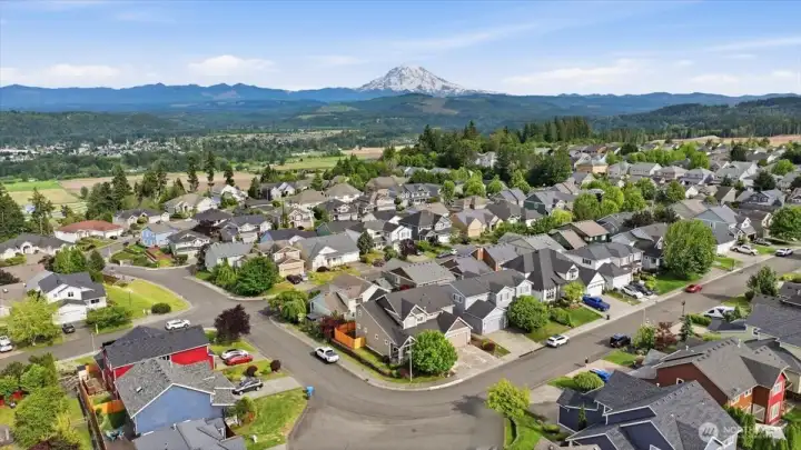 Corner lot at the pinnacle of the height in the neighborhood.  Views of Mount Ranier from some of the bedrooms