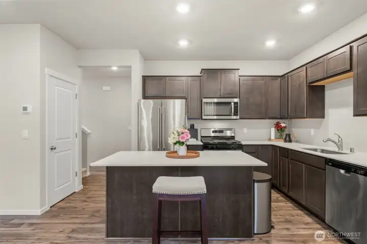 Spacious kitchen with natural gas over/range