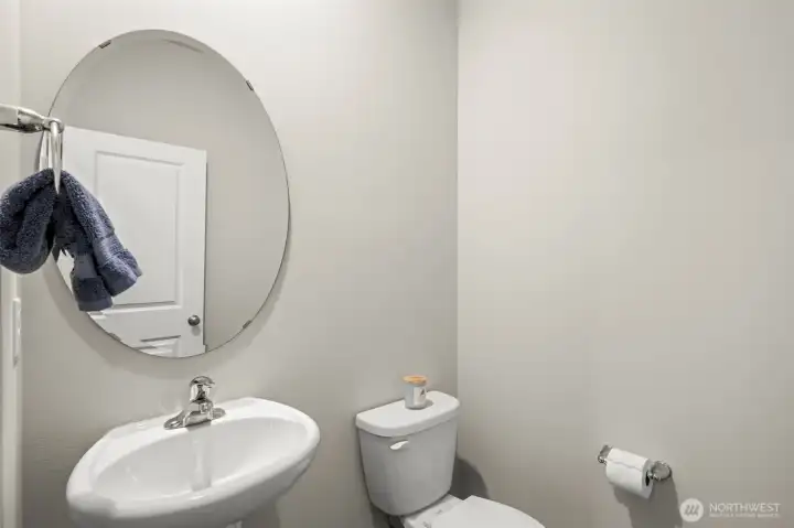 Downstairs half bath perfect for any guests