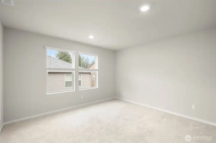 Generously sized primary bedroom