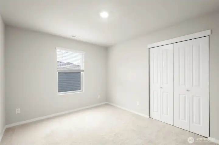 Upstairs bedroom facing side of house.