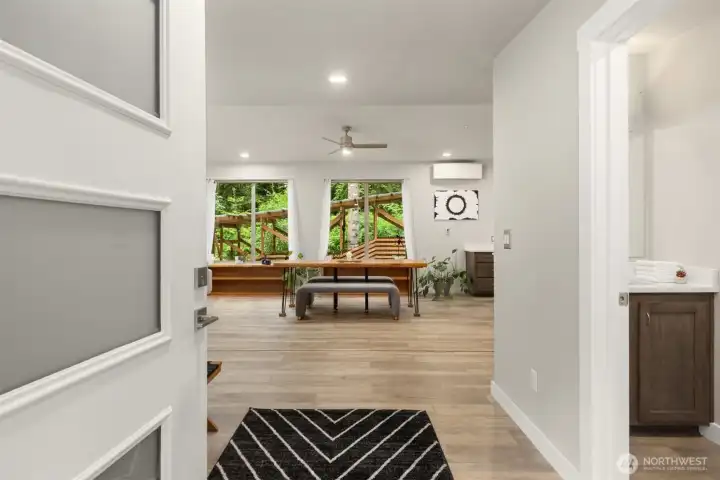 A seamless arrival experience where clean contemporary design opens directly to the surrounding forest landscape. A seamless arrival experience where clean contemporary design opens directly to the surrounding forest landscape.