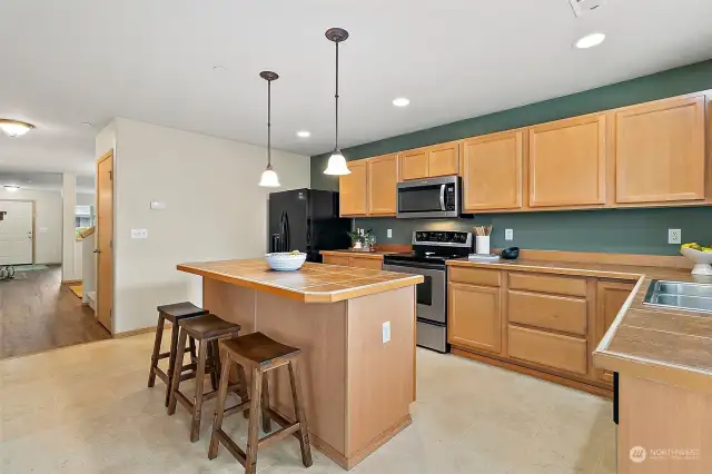 Generously Sized Kitchen w/ Loads of Maple Cabinetry & Breakfast Island!