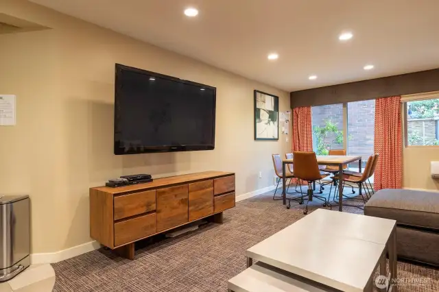 Community Lounge features a media center, kitchenette and 1/2 bath.
