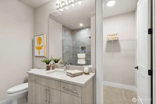 En suite bath and walk in closet off 2nd bedroom.