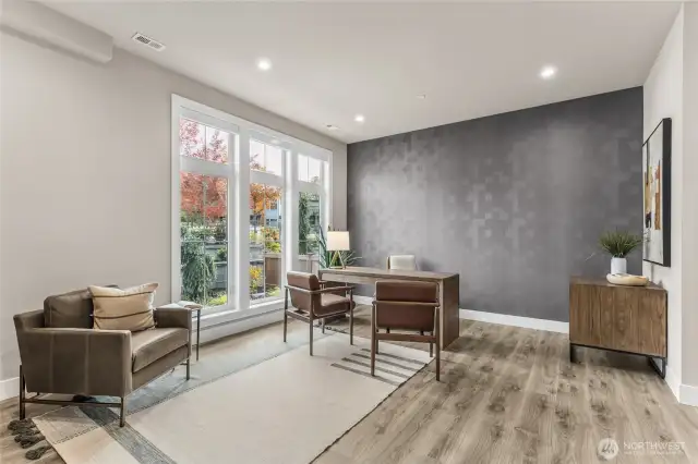 Main floor home office or bedroom w/ en suite bath & walk in closet. Very spacious!