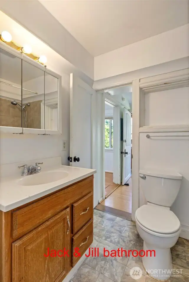 Another view of the one full bathroom.