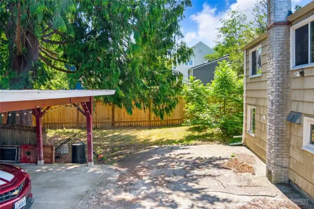 Covered Parking & Outdoor Space Two-car covered parking with a backyard and patio.