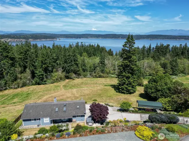 Just over 1/2 acre abuts to community drain field, privacy, view and peace!