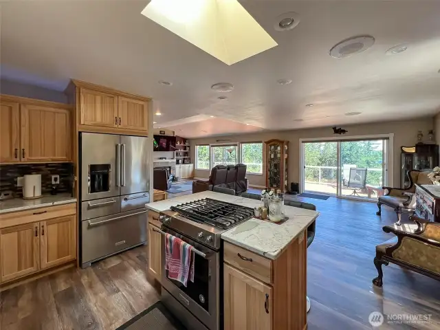 Great room with 4 skylights for optimal lighting.