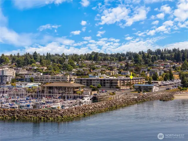 NW living without the maintenance of a yard. Spend your time boating or doing other things you love yet have a killer view and the convenience to all the necessities.