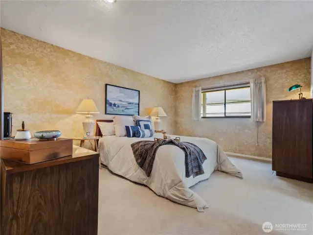 This primary bedroom will be your private retreat.