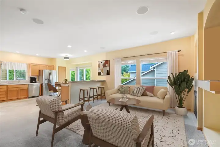 Open family room is definitely a gathering spot. Gas fireplace and lots of light add to the charm of this fantastic family room!