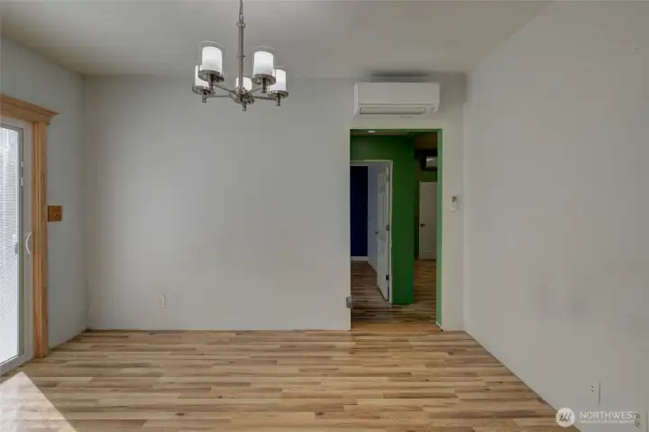 Dining room with slider to side yard