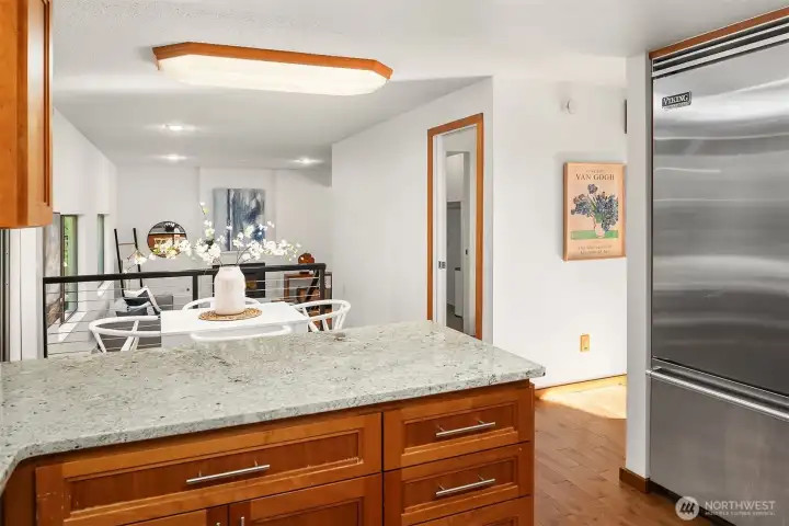 The eating bar connects to the nook and slider to the backyard.
