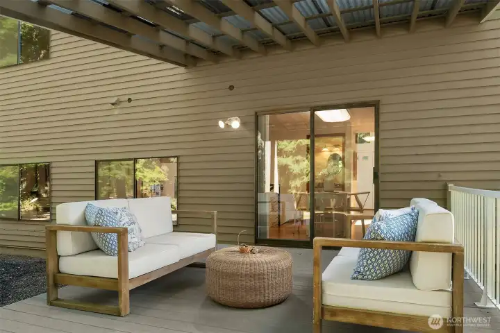 The deck is expansive with covered & uncovered areas.