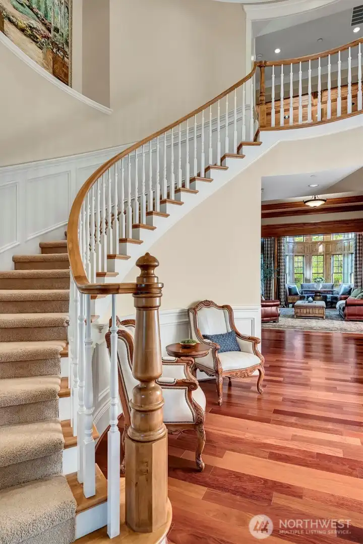 Winding staircase leads to 2nd floor