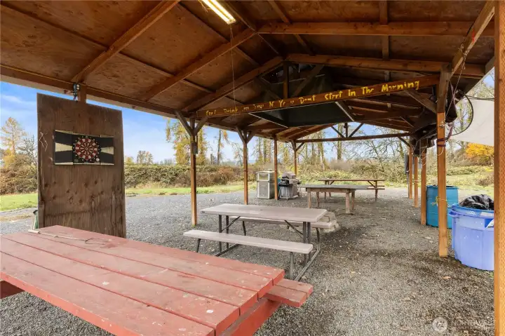 Covered structure ideal for year-round enjoyment.