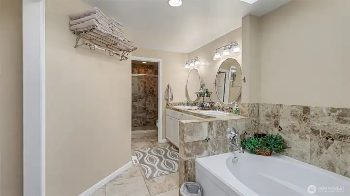 A thoughtfully designed ensuite with room to relax and refresh.