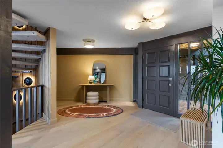 Spacious entry with closet tucked into the corner