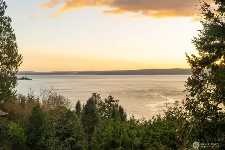 View from primary bedroom deck at sunset