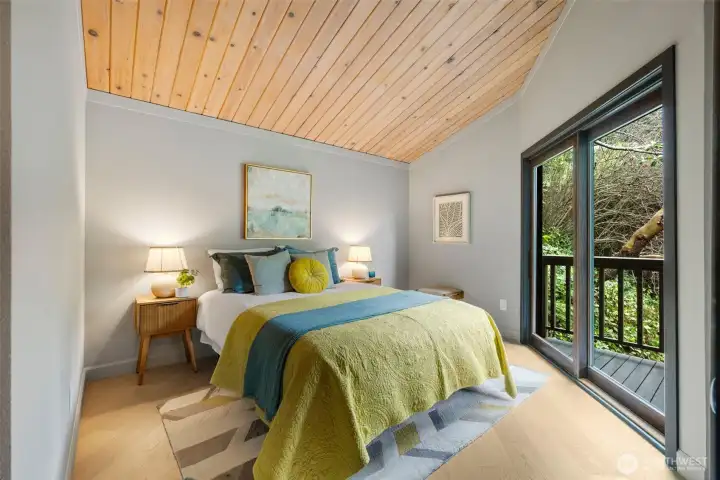 Guest bedroom with room for a queen (bed)! Slider to deck and double closet