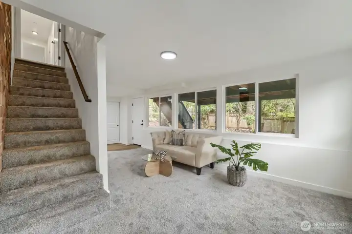 Lower level enjoys new carpeting and lots of spaces to explore