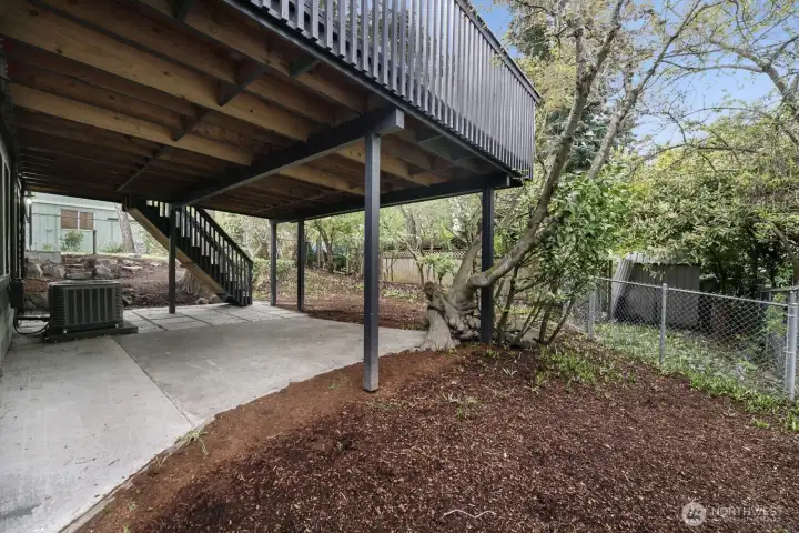 Spacious yard with deck and lower patio