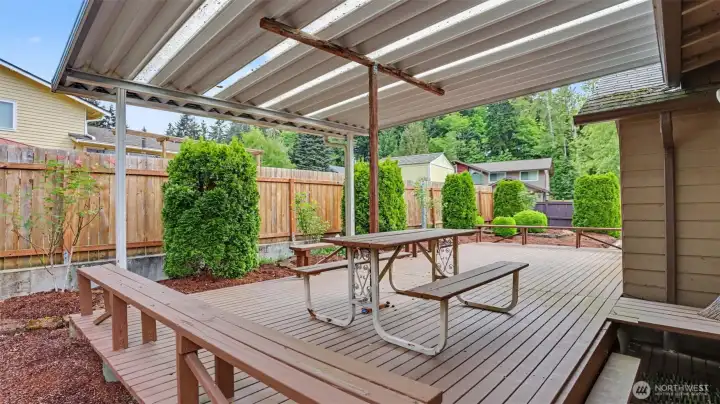 Spacious deck with partial cover.
