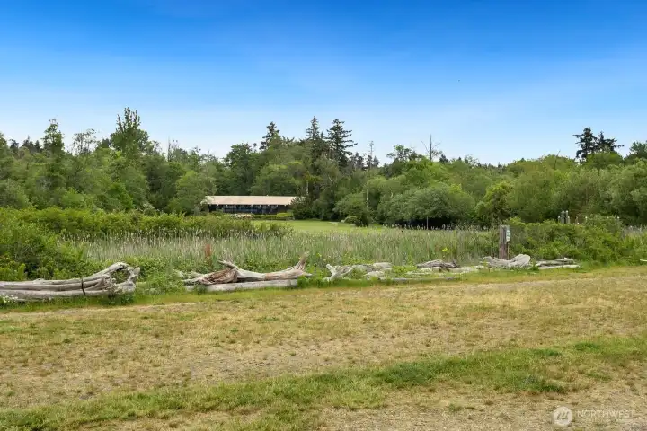 The Cove amenities include a large playfield, walking paths, tennis courts and a clubhouse.